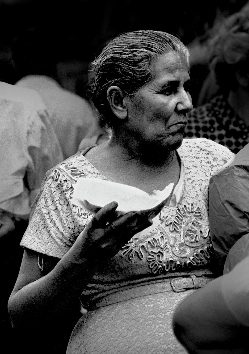  Lady eating a melon - In an outdoor market. - Photojournalism - Life Magazine - Black and white photography - Canon rangefinder and SLR cameras - Tony Karp, design, art, photography, techno-impressionist, techno-impressionism, aerial photography , drone , drones , dji , mavic pro , video , 3D printing - Books -