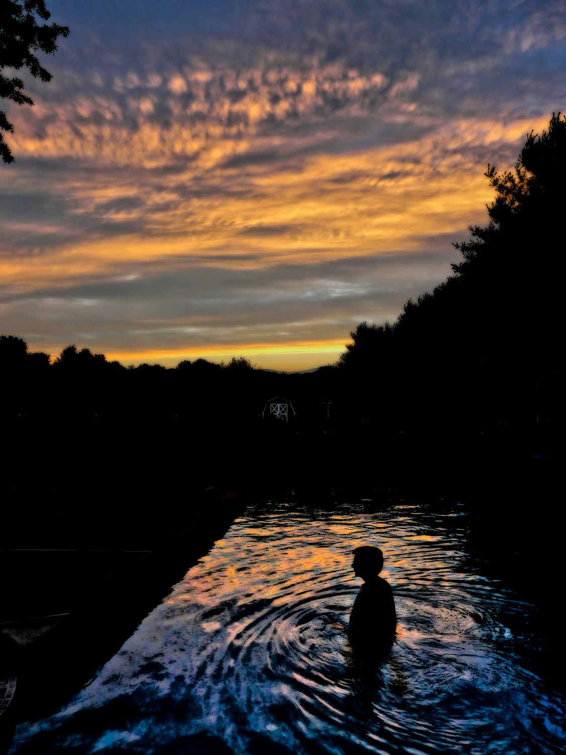 The artist's muse - the Hobbitt - in the pool at sunset #1 - The artist's muse at sunset -- DMC-FZ18 -  Panasonic DMC-FZ18 - Tony Karp, design, art, photography, techno-impressionist, techno-impressionism, aerial photography , drone , drones , dji , mavic pro , video , 3D printing - Books -