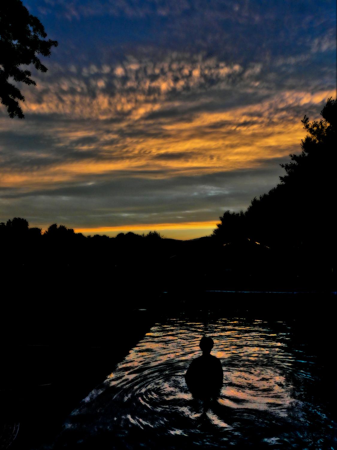 The artist's muse - the Hobbitt - in the pool at sunset #2 - The artist's muse at sunset -- DMC-FZ18 -  Panasonic DMC-FZ18 - Tony Karp, design, art, photography, techno-impressionist, techno-impressionism, aerial photography , drone , drones , dji , mavic pro , video , 3D printing - Books -