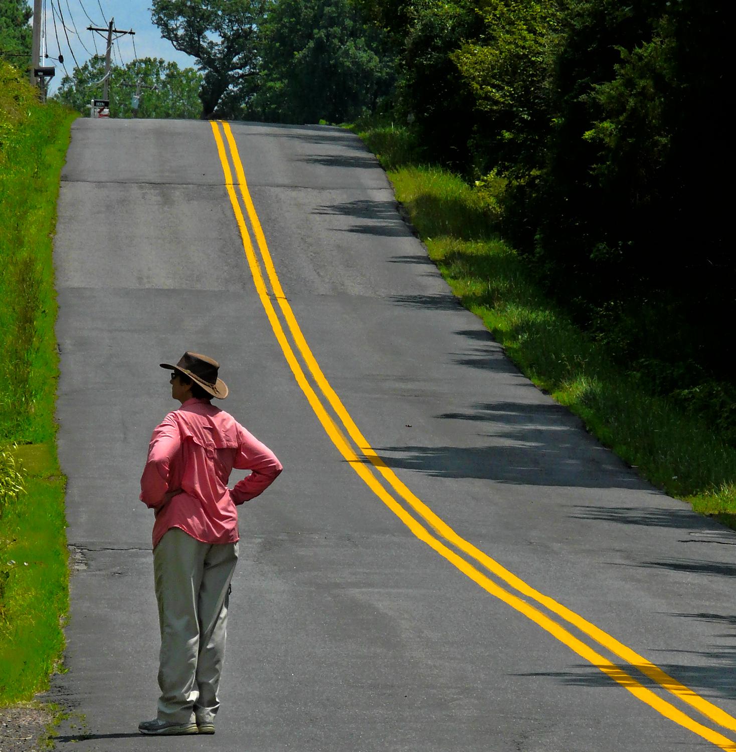 the artist's muse by a hilly road with a yellow stripe - The artist's muse contemplates the next hill on the way home. - Panasonic DMC-FZ18 - Tony Karp, design, art, photography, techno-impressionist, techno-impressionism, aerial photography , drone , drones , dji , mavic pro , video , 3D printing - Books -