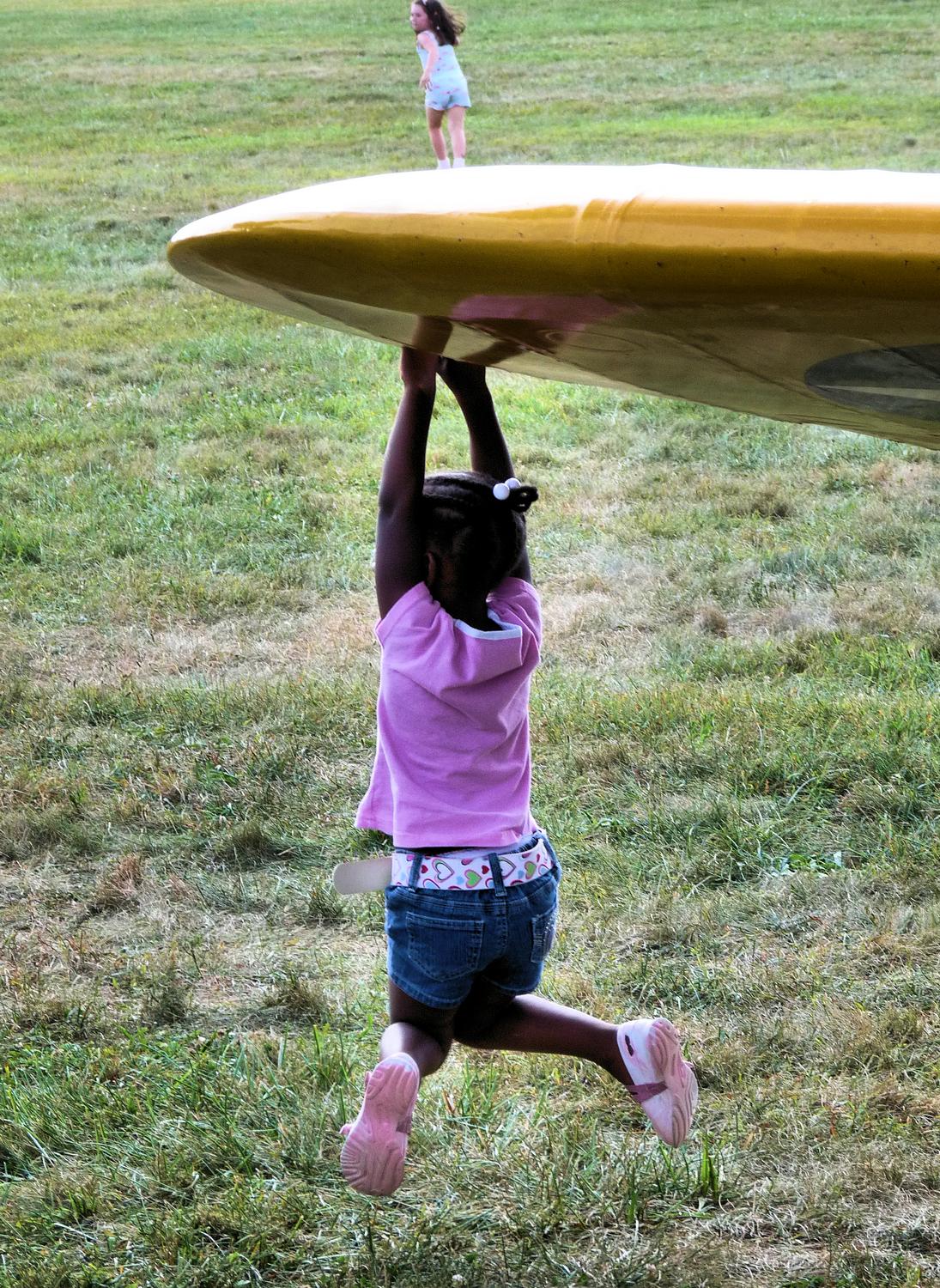 girl hanging from airplane wing - A future wing walker hones her skills. - Panasonic DMC-FZ28 -- At the Flying Circus - Bealton Virginia - Tony Karp, design, art, photography, techno-impressionist, techno-impressionism, aerial photography , drone , drones , dji , mavic pro , video , 3D printing - Books -