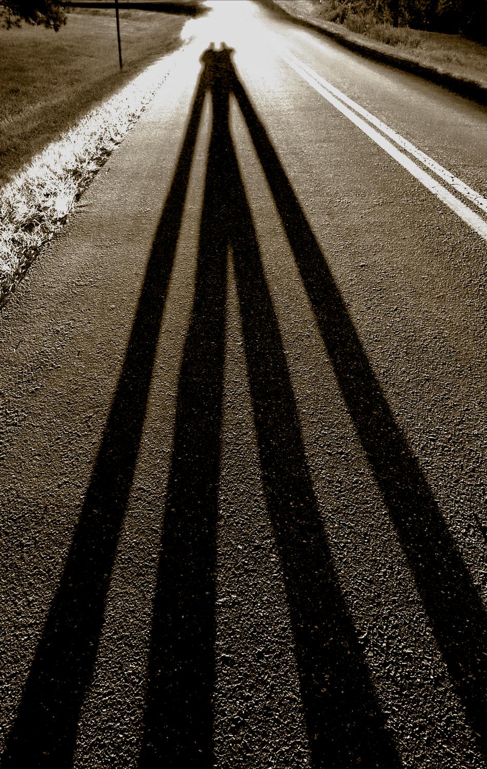 long shadows on the road - The artist and his muse intertwined on the road - Panasonic DMC-FZ28 - Tony Karp, design, art, photography, techno-impressionist, techno-impressionism, aerial photography , drone , drones , dji , mavic pro , video , 3D printing - Books -
