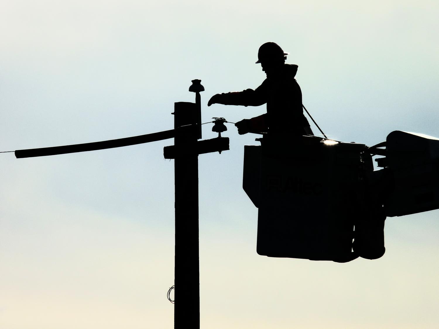  - Here, the pole dancer is cleaned up and reduced to a silhouette. A little more interesting, but still not there, - Panasonic dmc-28 - electrical lineman working on a pole - Tony Karp, design, art, photography, techno-impressionist, techno-impressionism, aerial photography , drone , drones , dji , mavic pro , video , 3D printing - Books -