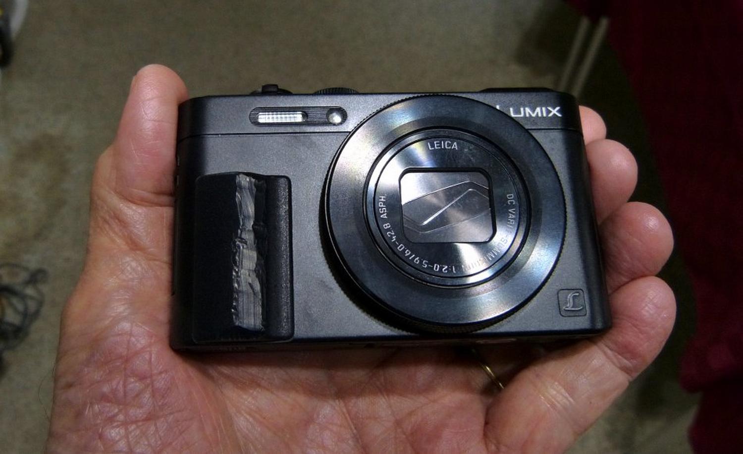  - This shows where I mounted Flipbac G1 grip on the front of the DMC-LF1.<br>I used a knife to carve away (somewhat crudely) the sharp edge.<br>Note how the ring around the lens leaves little clearance for your fingers when using the grip. - Tony Karp, design, art, photography, techno-impressionist, techno-impressionism, aerial photography , drone , drones , dji , mavic pro , video , 3D printing - Books -