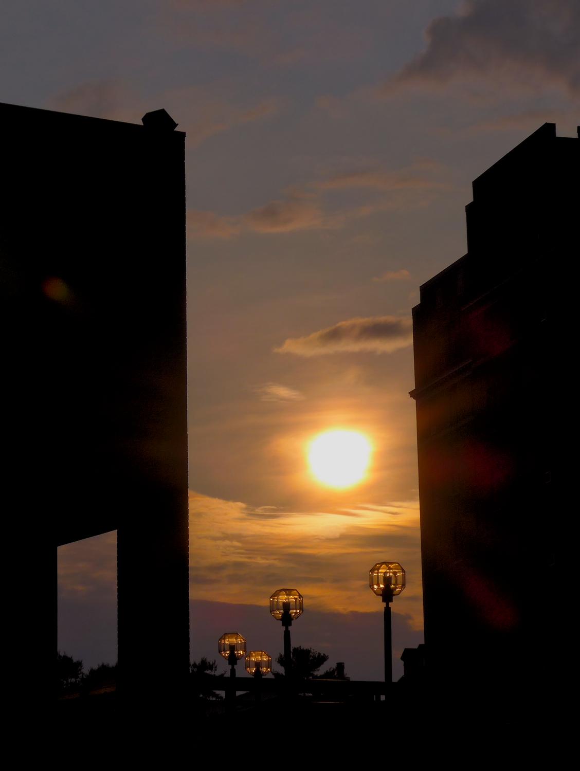  - The sun setting between some buildings with interesting shapes. - Adams Morgan, Washington DC, Panasonic DMC-LF1, Mediterranean Bistro, sunset - Tony Karp, design, art, photography, techno-impressionist, techno-impressionism, aerial photography , drone , drones , dji , mavic pro , video , 3D printing - Books -